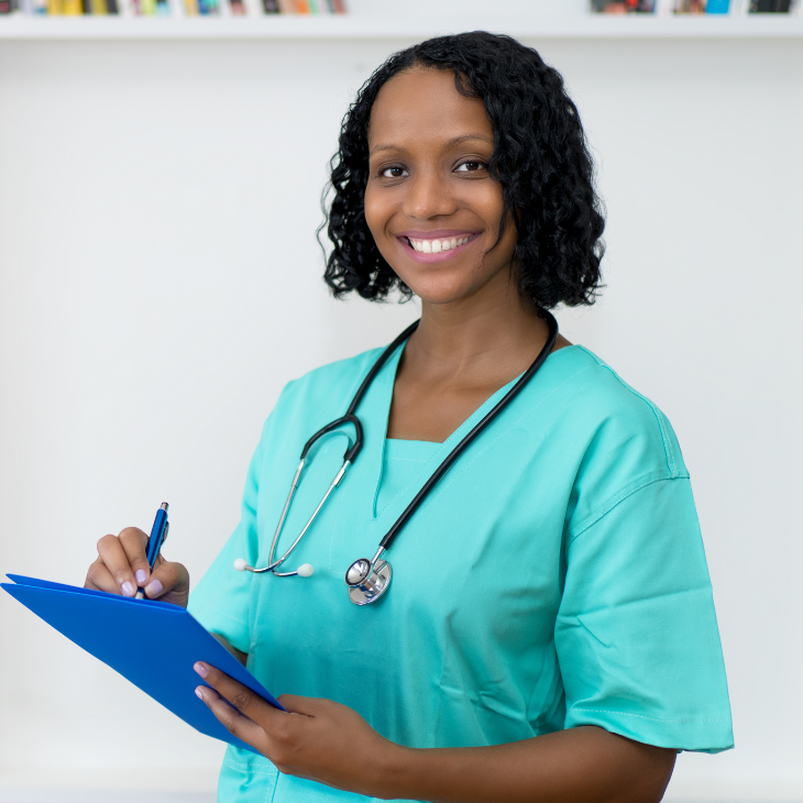 REI nurse poses while holding patient charts